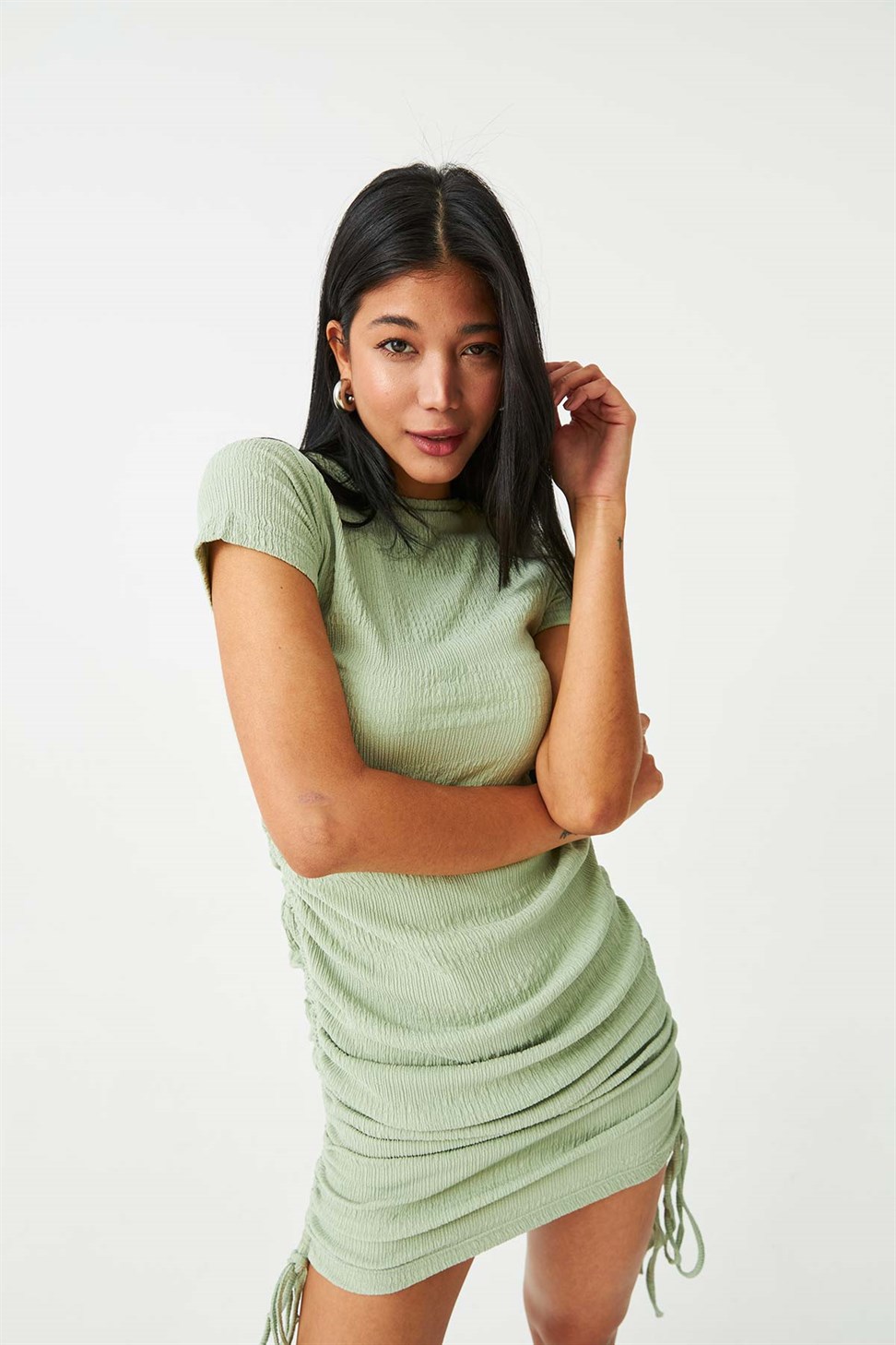 Mint green dress with shirred sides